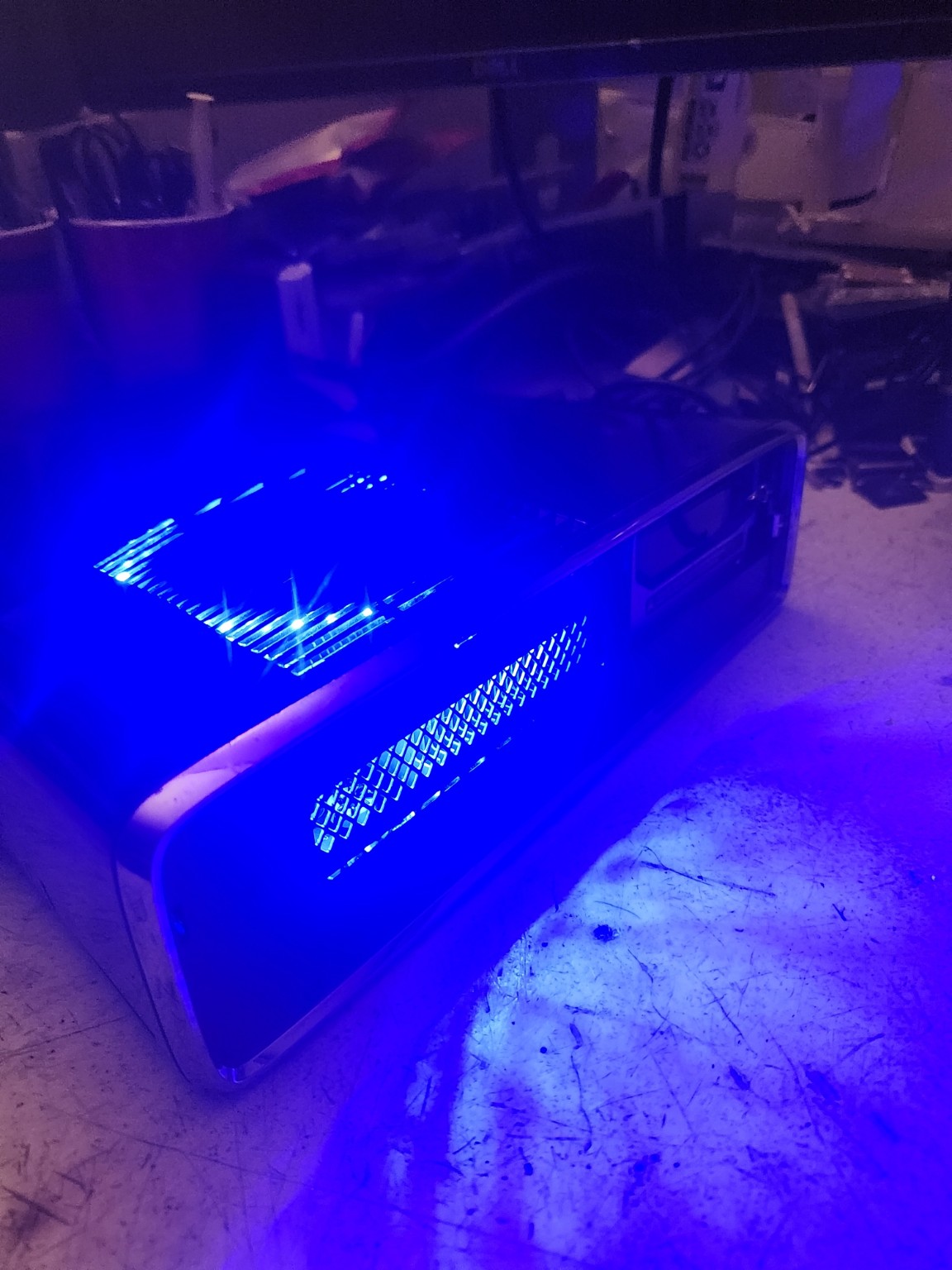 Xbox 360 Slim 1TB blue lighting photo 3