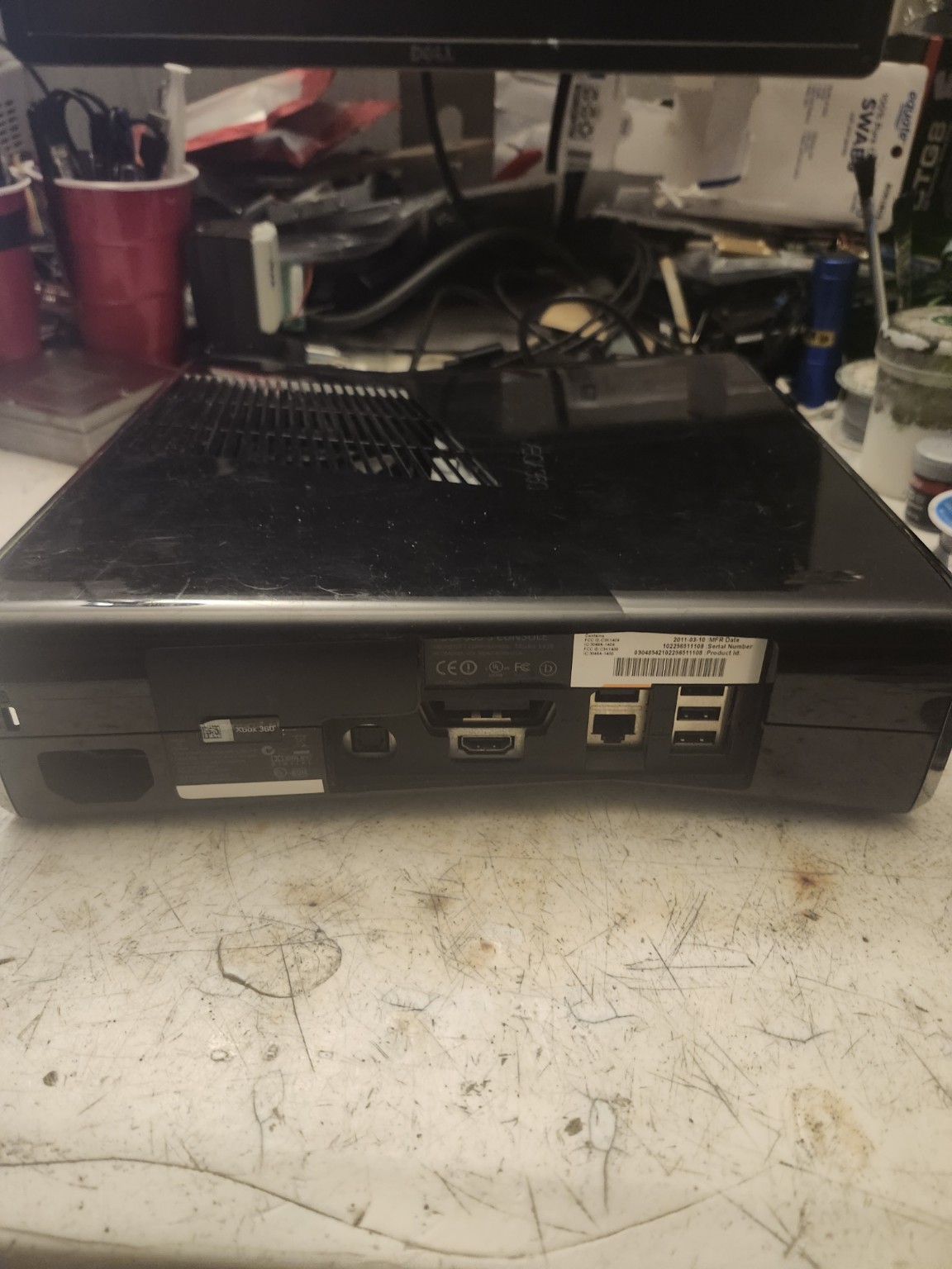 Xbox 360 Slim 1TB blue lighting photo 6