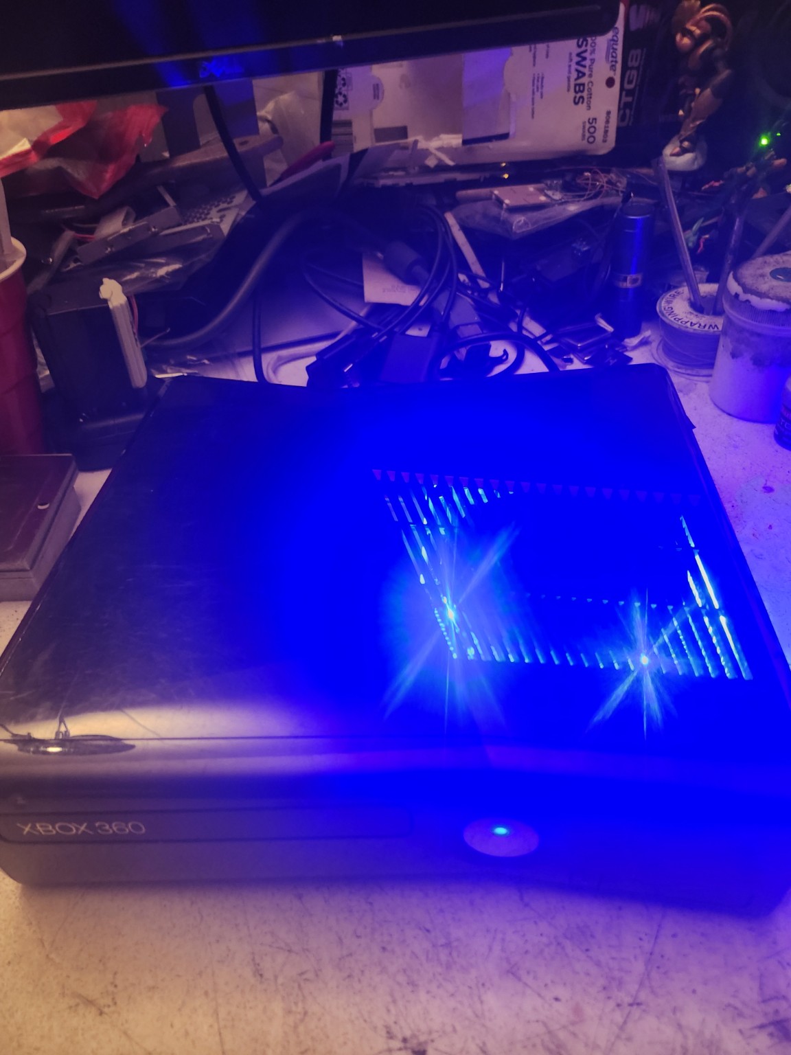 Xbox 360 Slim 1TB blue lighting photo 7