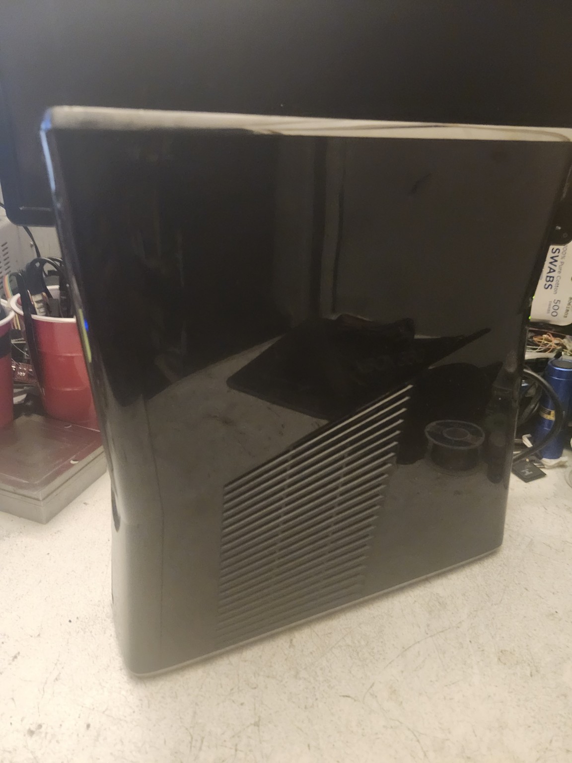 Xbox 360 Slim 1TB blue lighting photo 9